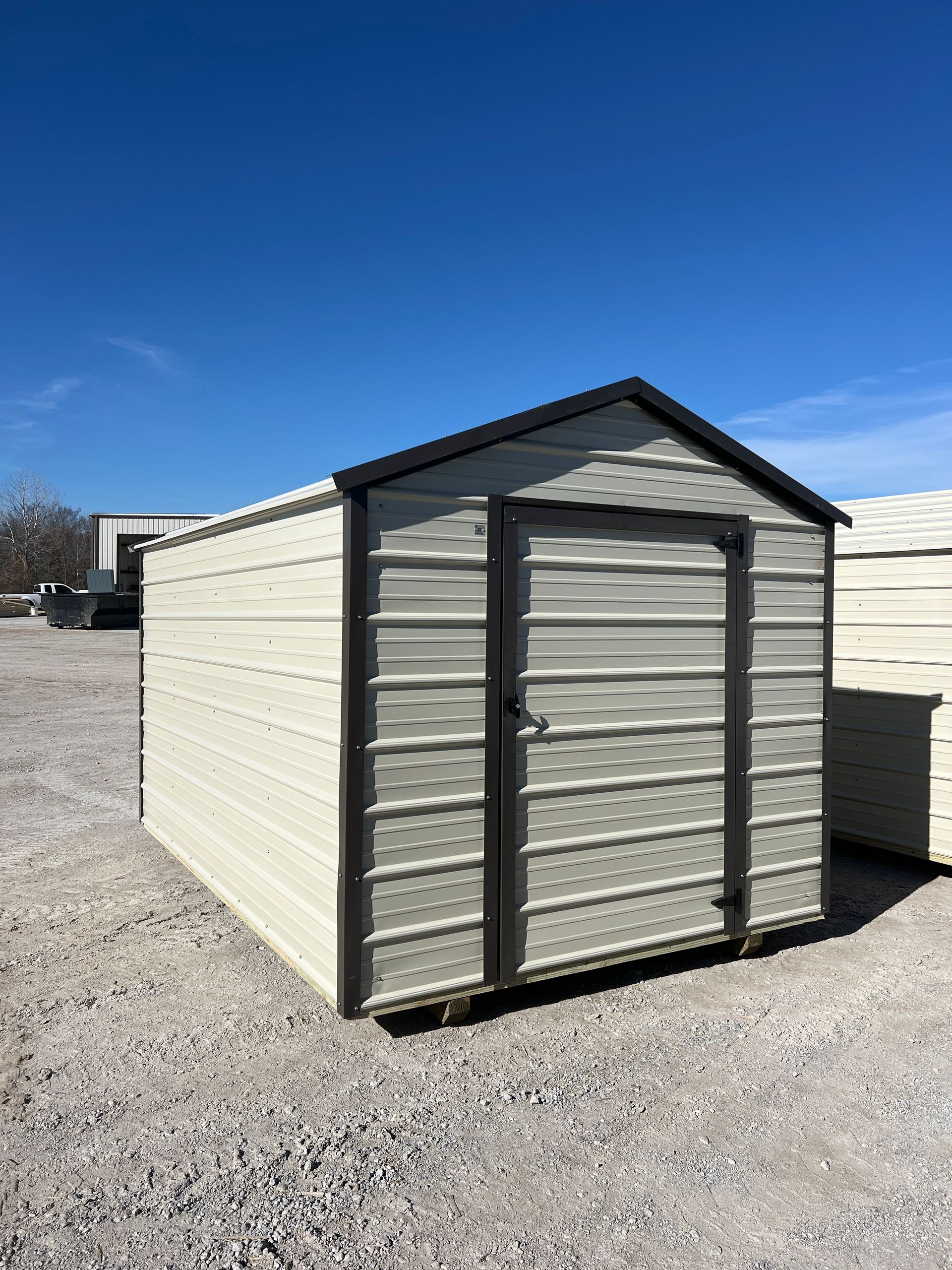 Explore the Derksen 8X12 EMUT with Light Stone siding and roof